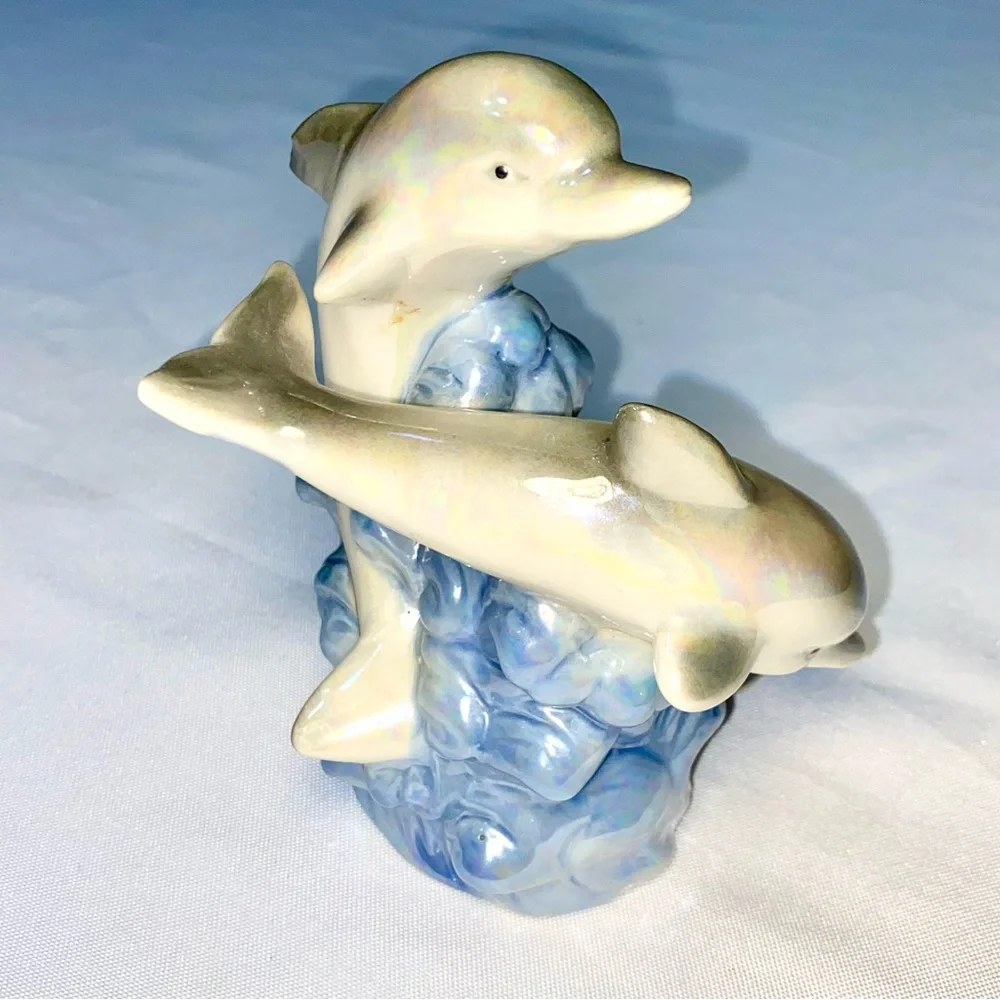 Glazed Ceramic Dolphin Trio on a blue Wave